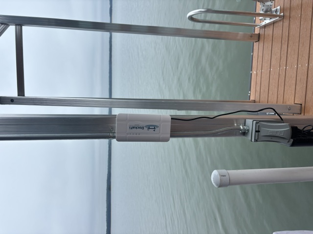 DockaFi mounted on a dock post overlooking a lake