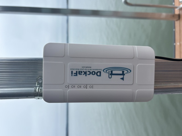 DockaFi device mounted on a post over the water
