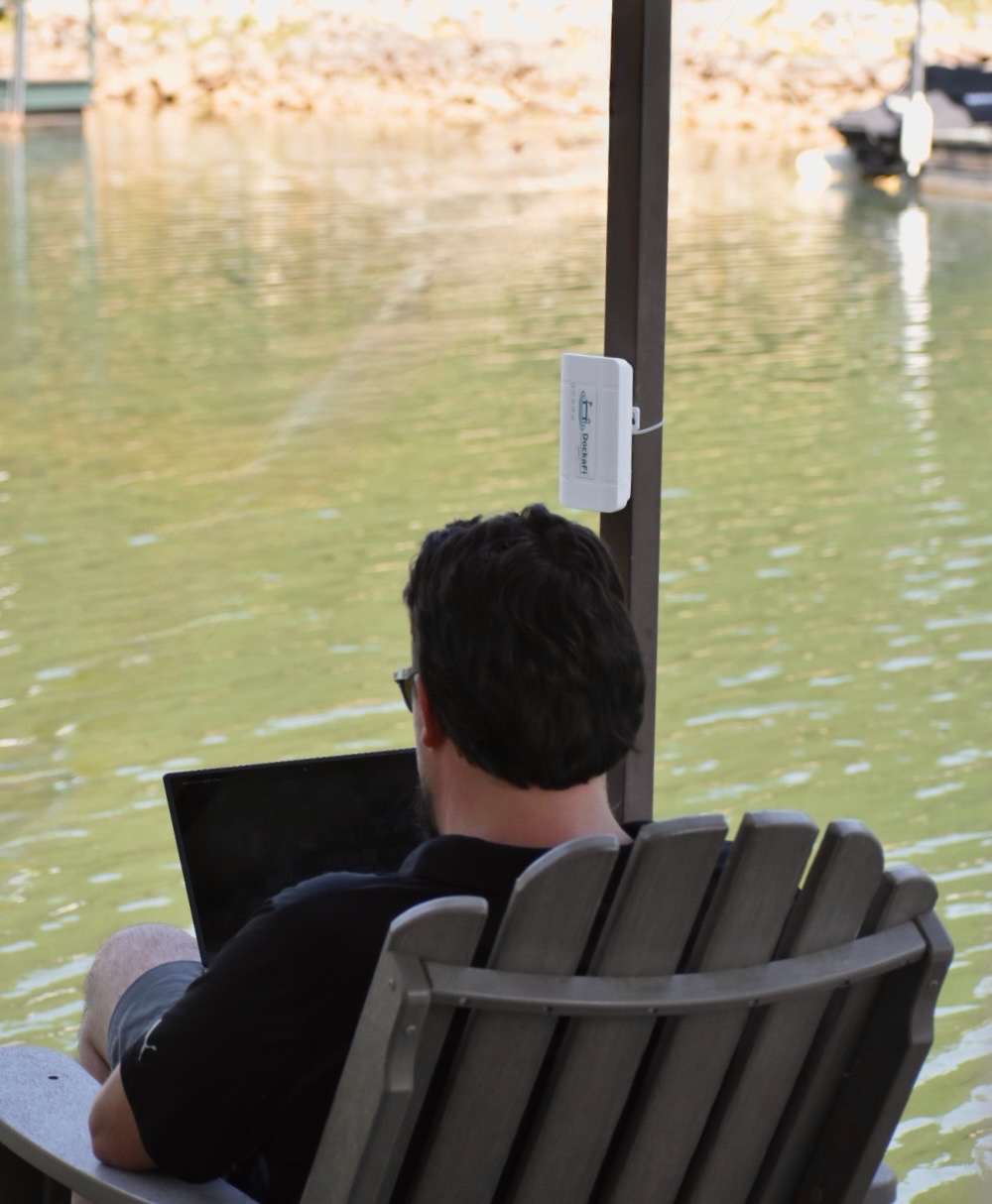 DockaFi mounted on dock post, back view overlooking the water